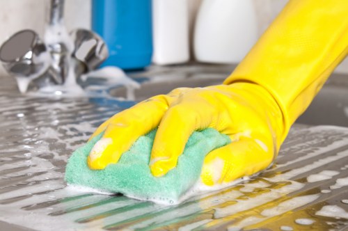 Routine cleaning in a Camden flat with modern living space