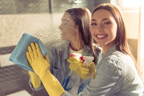 Cleaner working in a Camden kitchen during a domestic cleaning visit